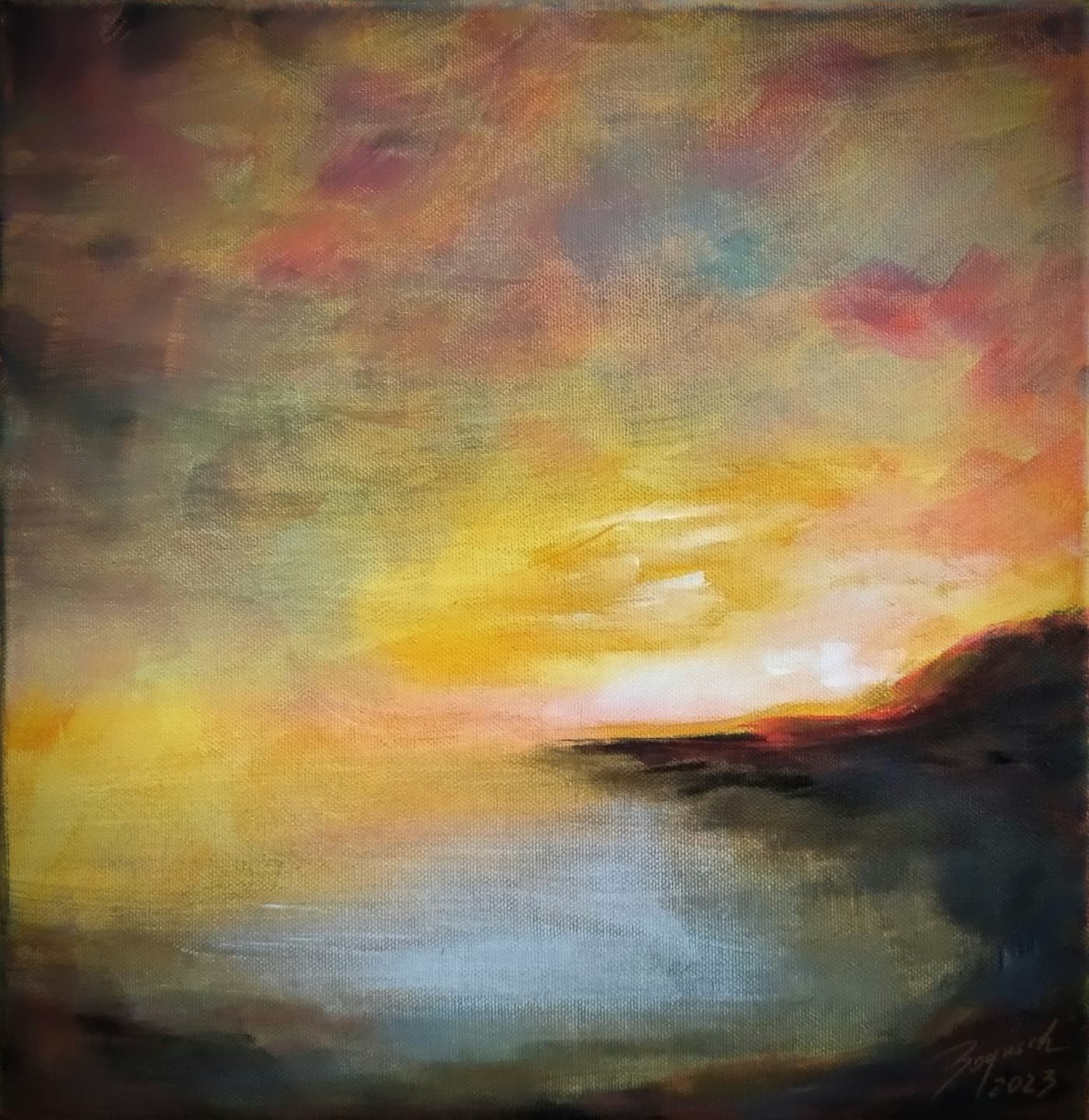 Amber — a golden sunset burning through cloud over dark still water.