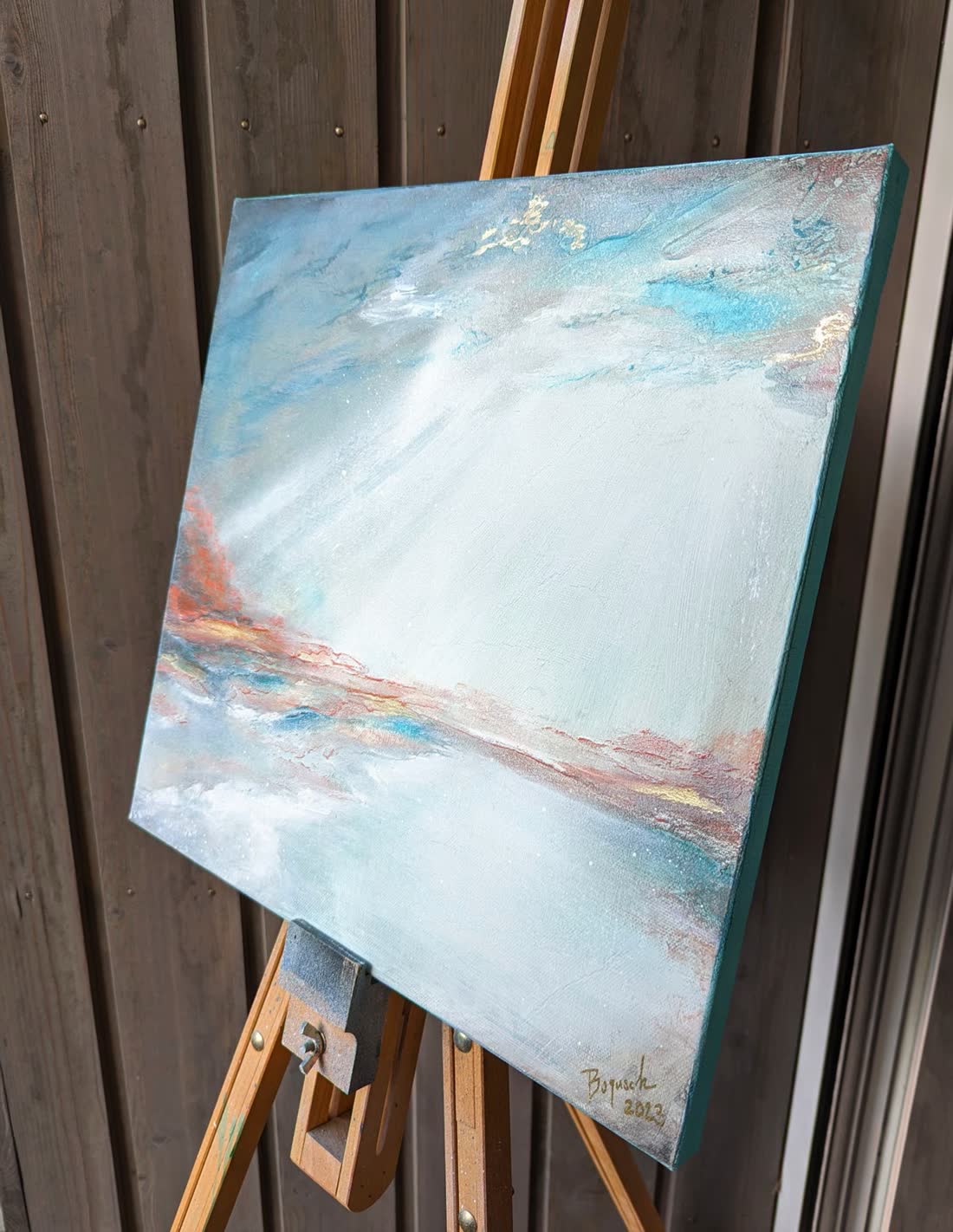 Breath on the easel in the studio, seen from an angle.