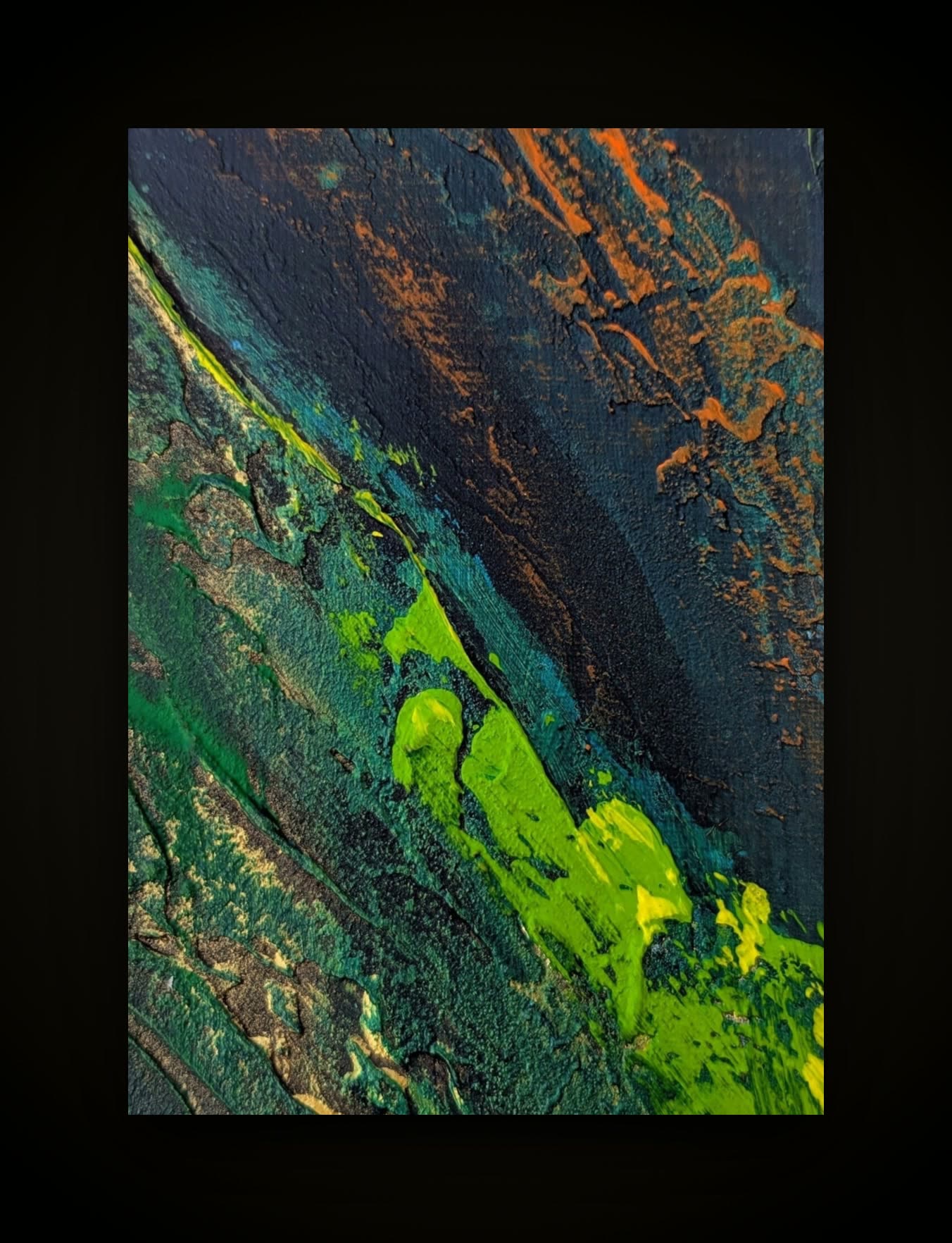 A dark canvas cut by a diagonal of orange and acid green.